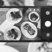 Person taking a photo of food