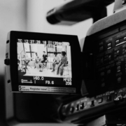 person operating video camera