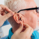 Patient having a hearing aid fitted - TympaHealth Case Study by AMBITIOUS
